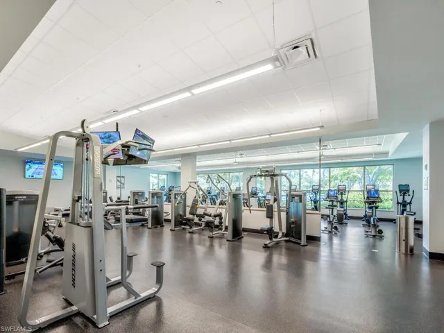 Workout area featuring a paneled ceiling