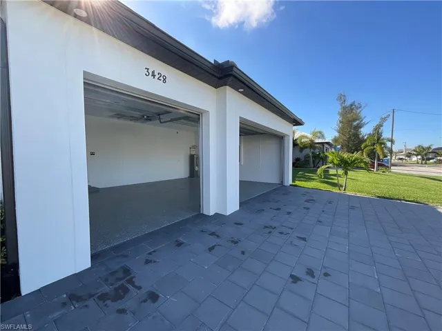 Garage with a lawn