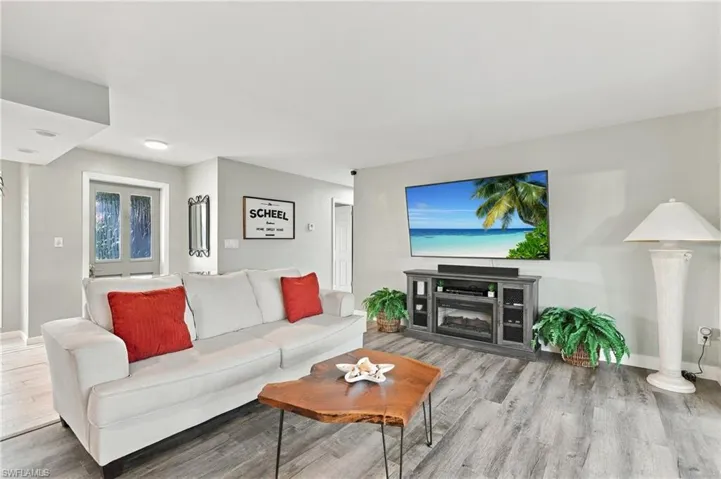 Wood-finish flooring throughout the space