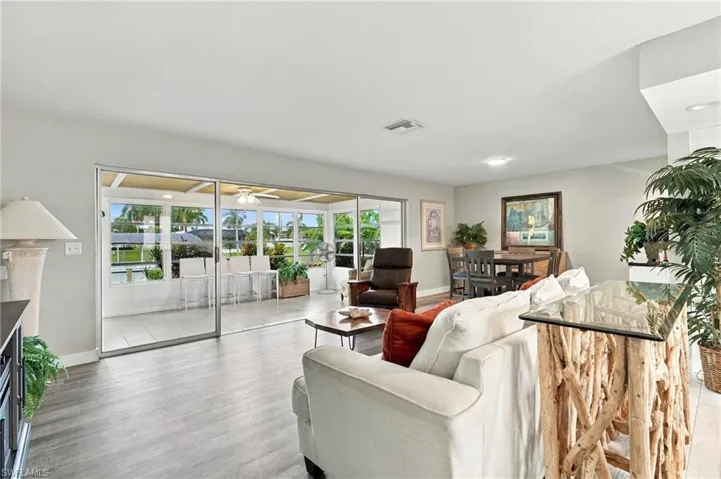 Spacious interior with wood-finish flooring and light-toned walls