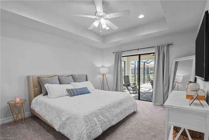 master bedroom with sliders to lanai