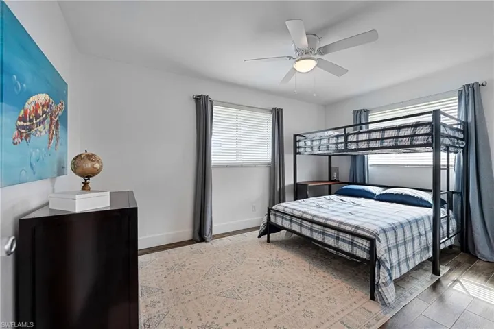 2nd bedroom with ceiling fan