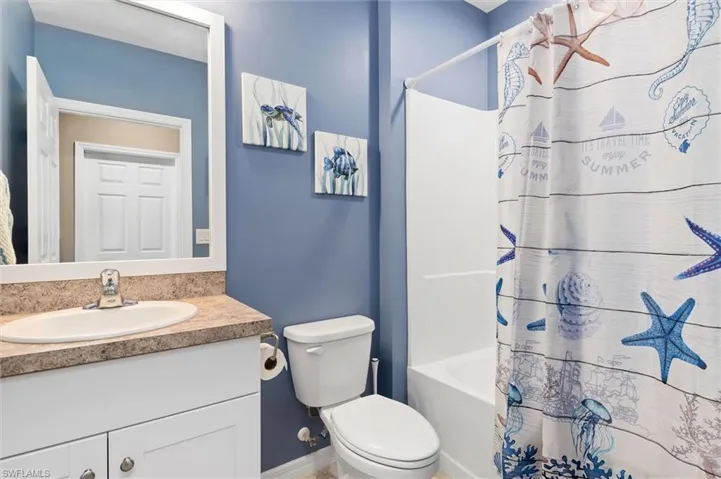 Second bathroom has a shower tub