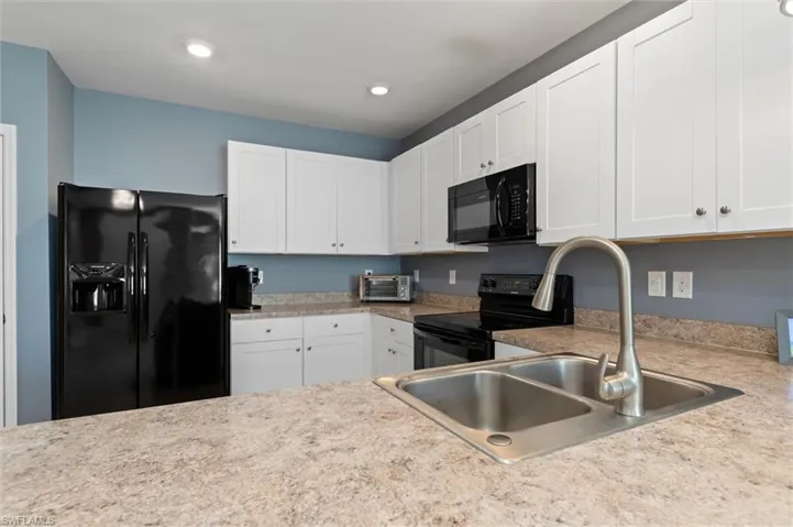 The Kitchen is just the right size, big breakfast bar, lots of work space