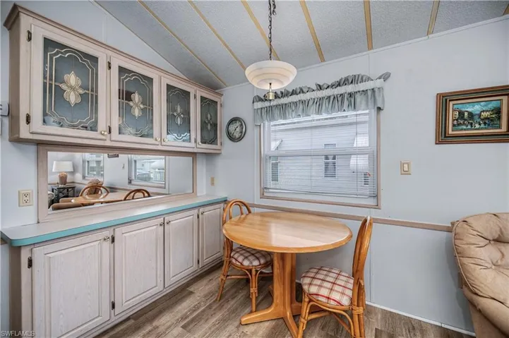 Dining area with light wood finished floors