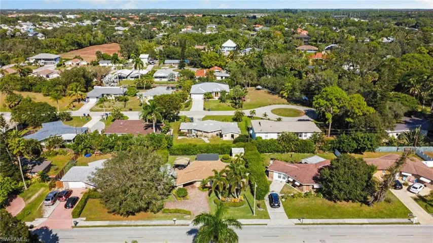 View of property location with nearby suburban area