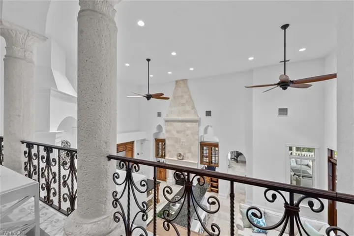 Hall with a towering ceiling and decorative columns
