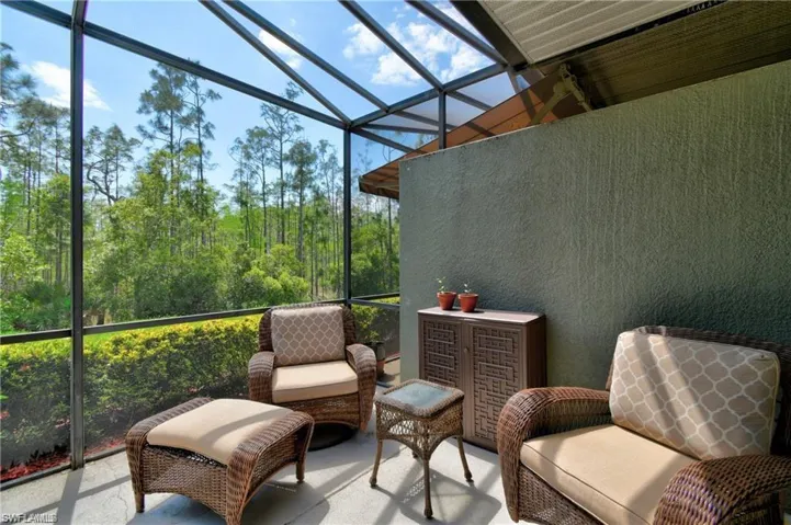 Sunroom with lofted ceiling and plenty of natural light