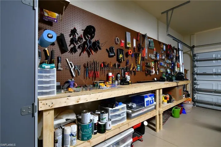 Garage featuring a workshop area