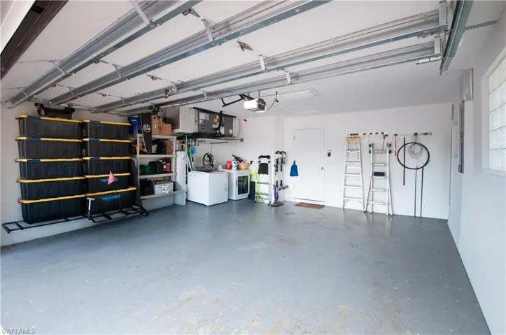 Garage with washing machine and dryer