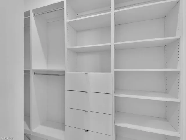 View of walk in closet on the primary bedroom.