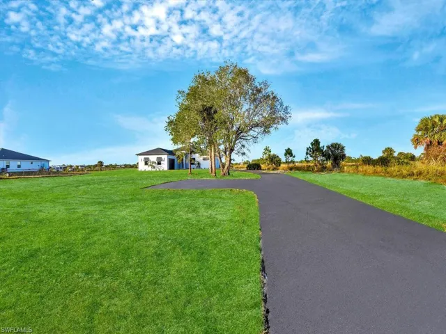 View of front of the house with a front lawn