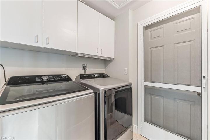 laundry and out to 2 car attached garage