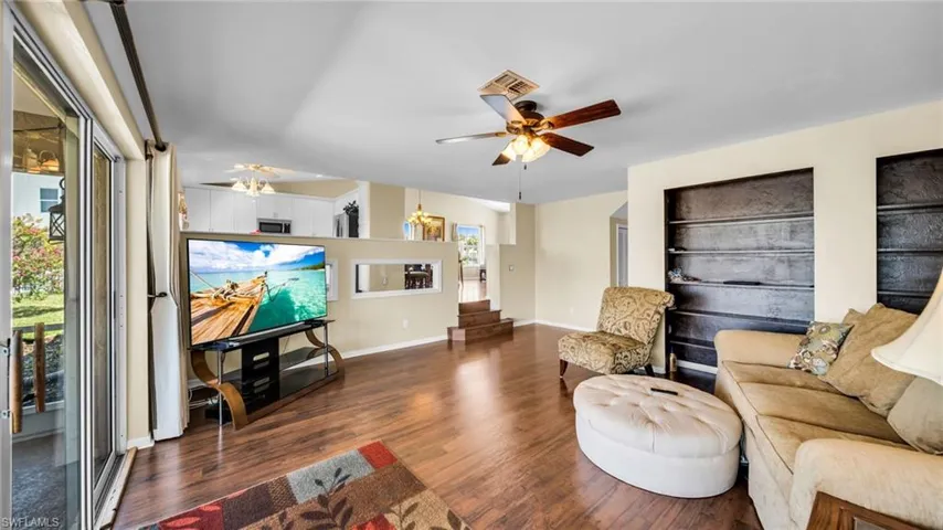 Family Room with Sliders to Oversized Lanai with Huge Lake View