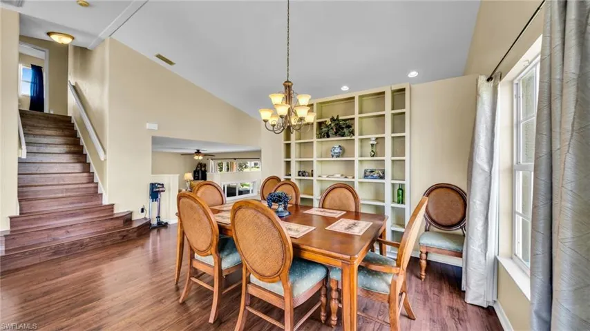 Formal Dining Room with wood-type floors, stairway to 2nd Floor Bedrooms