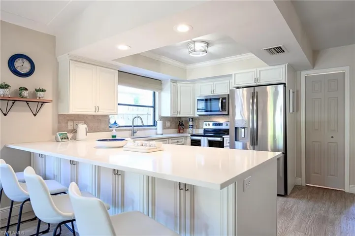 672  100th  AVE, Naples, FL 34108