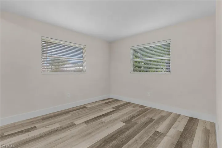 Spare room featuring light hardwood / wood-style flooring