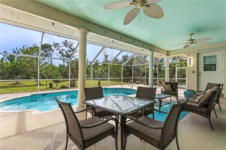 Sitting area by the pool.  The door in the background is the pool bath