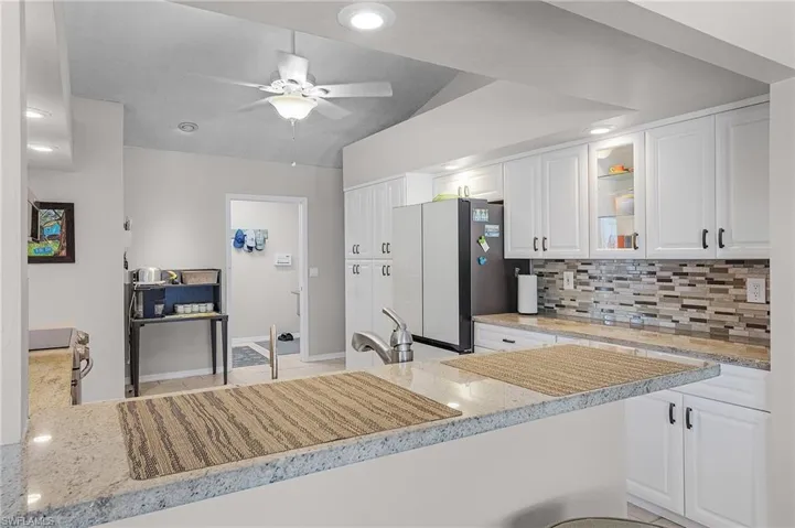 Breakfast bar.  Pantry is next to the refrigerator