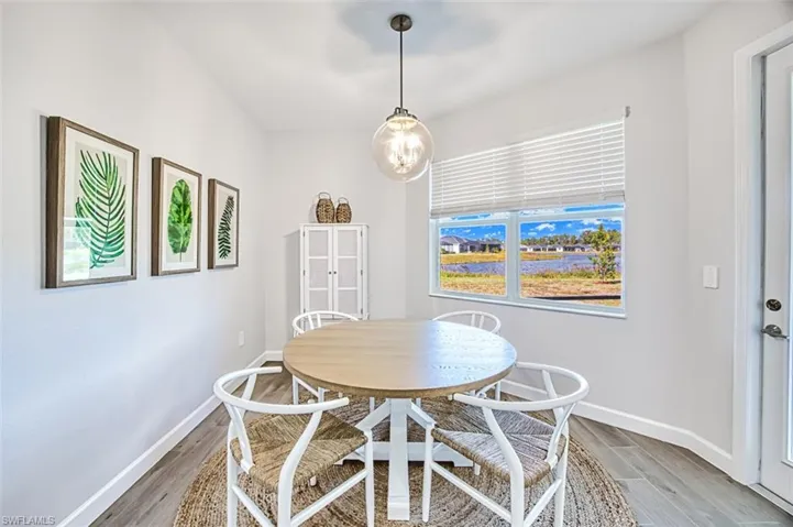 Dining room with hardwood / wood-style floors