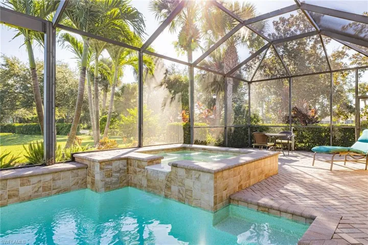 Spa with waterfall feature