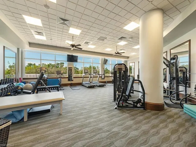 Exercise room with a paneled ceiling