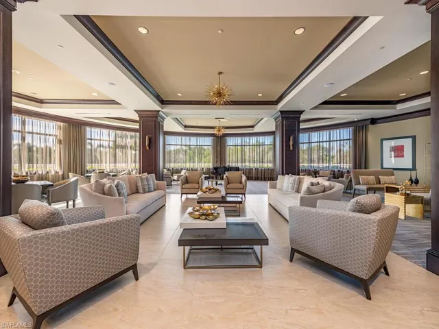Building lobby with recessed lighting and ornamental molding