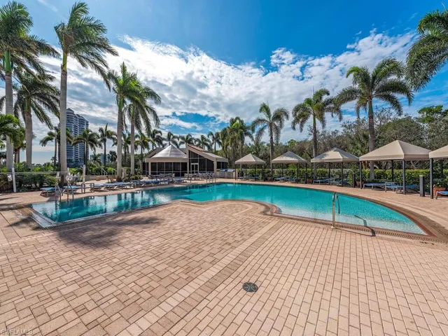Community pool featuring a patio area