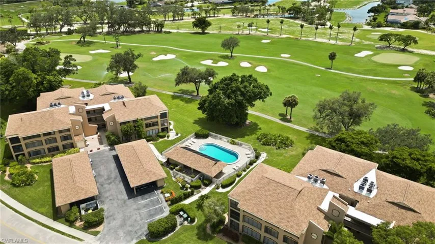 Aerial view of a nearby body of water and a local golf course
