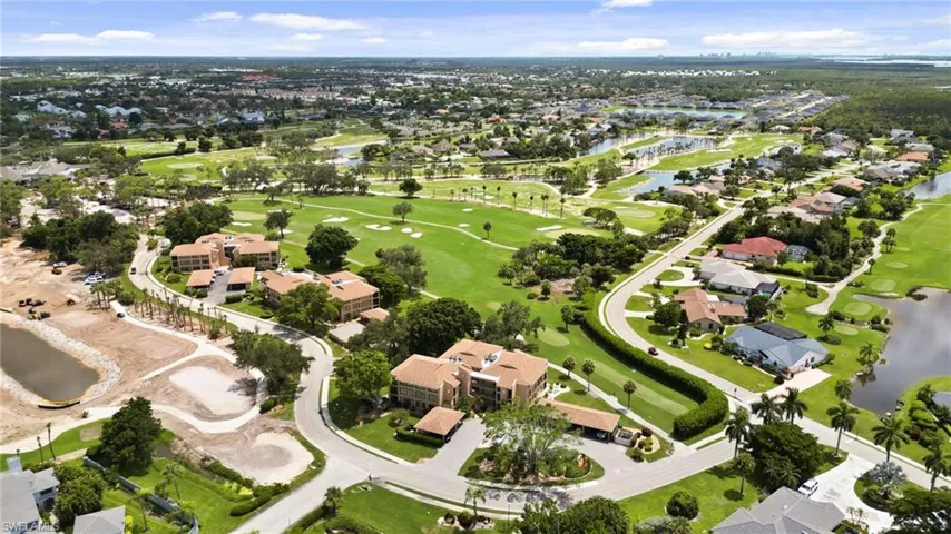 Aerial overview of property's location featuring nearby suburban area and a large body of water