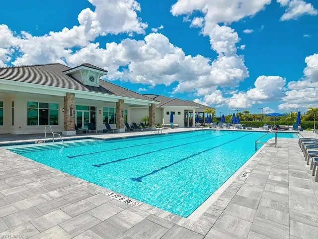 Community pool featuring a patio area