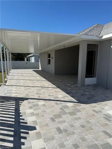 View of patio with an attached carport