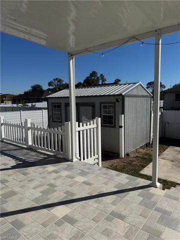 View of patio / terrace with an outbuilding