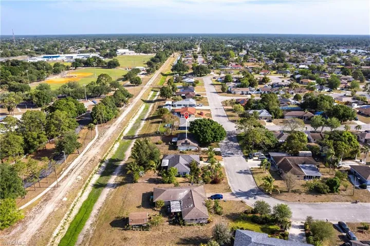 Birds eye view of property with a residential view
