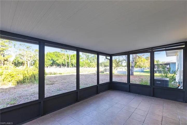 Unfurnished sunroom with a healthy amount of sunlight