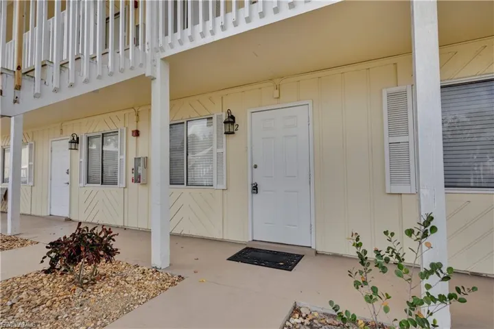 Entrance to property with board and batten siding