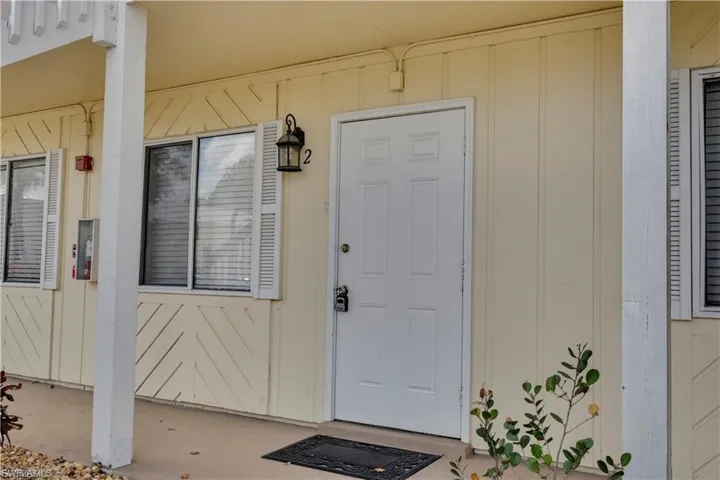 Entrance to property with a porch