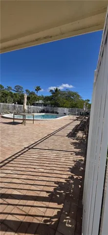 View of patio / terrace with a community pool