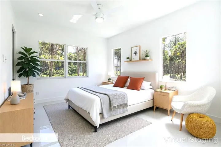 Virtual staged - Bedroom with a ceiling fan, recessed lighting, and concrete floors