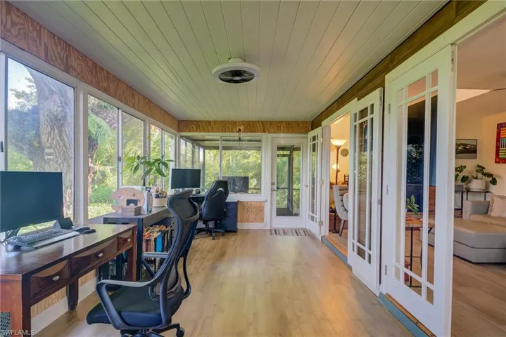 Home office featuring wood finished floors and wood ceiling