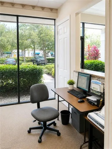 Floor-to-ceiling windows with exterior landscaping