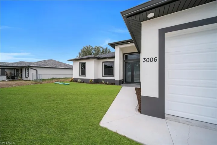 View of yard with a garage