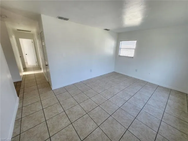 View of tiled spare room