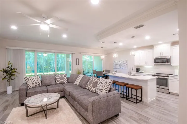 1467 Sq ft under air / 2000 sq ft  when you slide that back wall open - FANTASTIC  ** note how deliciously private this unit is** I wish mine was like that !!!  Love my neighbors BUT.....