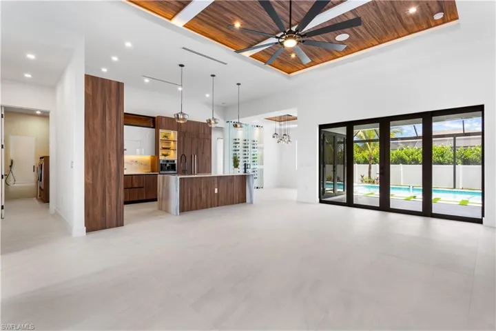 This luxury contemporary home features modern design elements, high-end finishes, open spaces, large windows, and state-of-the-art amenities, emphasizing comfort and sophistication.