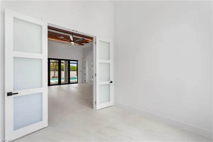 Frosted French Doors in the Den/Office for privacy and style.