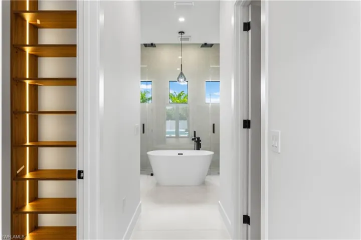 Peak at this state-of-art: master closet and master bathroom!