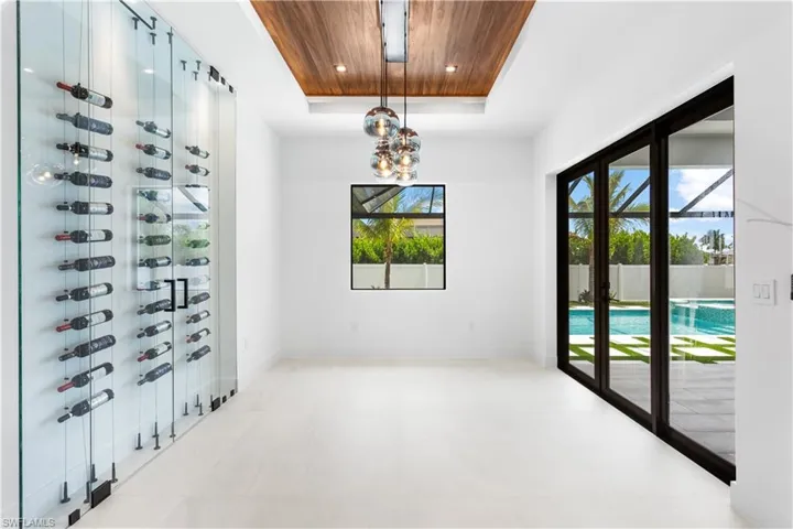 For WINE ENTHUSIASTS, elegant 55-bottle rack graces WINE CELLAR, adding SOPHISTICATION to your ENTERTAINING ENDEAVORS.