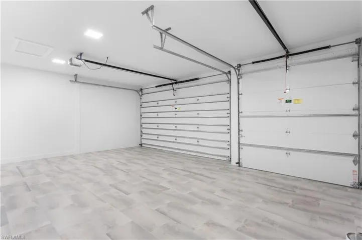 3-CAR GARAGE w/ INSULATED DOORS & CEILING for EFFICIENCY!