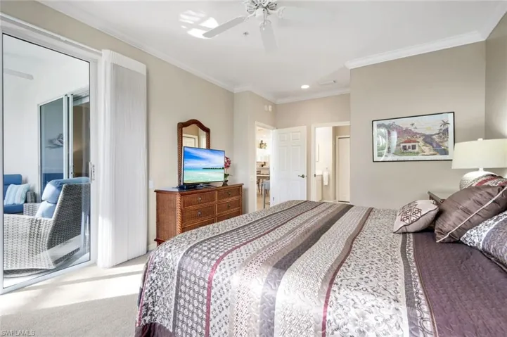 Bedroom with light carpet, ornamental molding, access to exterior, a ceiling fan, and recessed lighting